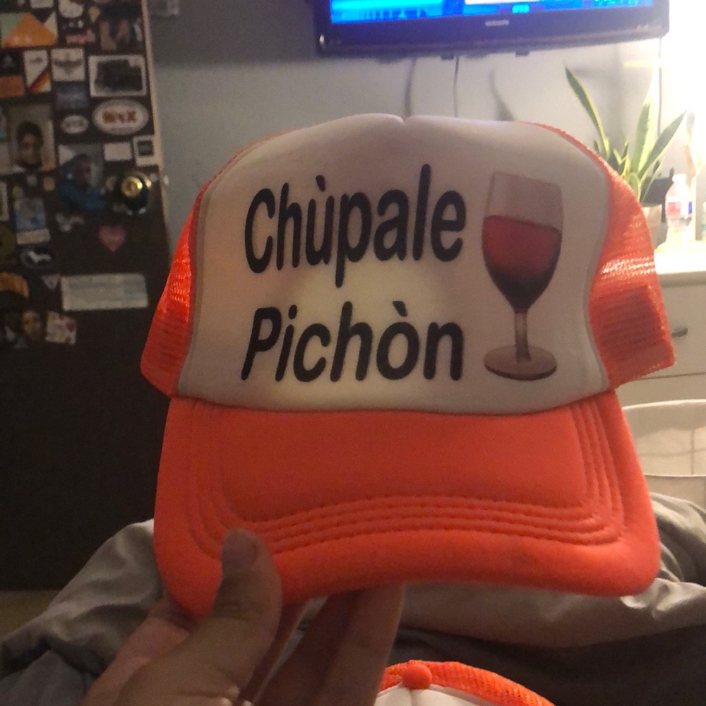 “Chúpale pichón” neon orange hat!